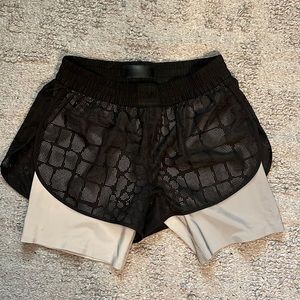 Alexander Wang x H&M reflective athletic shorts. Condition is Preowned.
